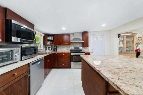 Tiny photo for 6635 Hope Street, Hollywood, FL 33024 (MLS # B26078836)