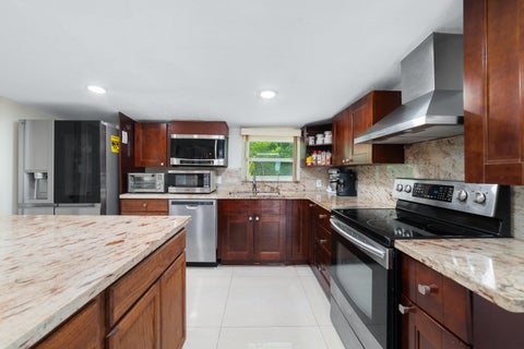Tiny photo for 6635 Hope Street, Hollywood, FL 33024 (MLS # B26078836)