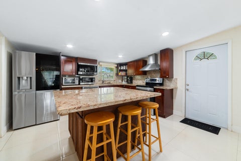 Tiny photo for 6635 Hope Street, Hollywood, FL 33024 (MLS # B26078836)