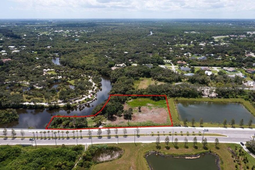 Unlock the potential of this unique 2.1-acre waterfront development site perfectly positioned along the rapidly developing Midway Road corridor. Offering over 500 feet of direct water frontage on a scenic tributary to the North Fork of the St. Lucie River, and 500+ feet of prime road frontage on Midway Road, this property is a rare find with unmatched visibility and access.

 
Potential for rezoning up to 5 units per acre. 

RU Land Use allows for Commercial Office and Neighborhood Commercial zoning.  
Perfect for a boutique waterfront town home community or a unique destination restaurant (up to 6,000 sq ft). MAJOR DEVELOPMENTS COMING TO MIDWAY RD. INCLUDING: A new Amazon Distribution Center, Wave Garden Surf Park(one of the largest wave parks in the world), and Wylder a 1,970 acre development of 4,000 homes.

Extension of water and sewer lines will be necessary to serve this site. Owners have hired an engineer to investigate best way to get utilities to the site.