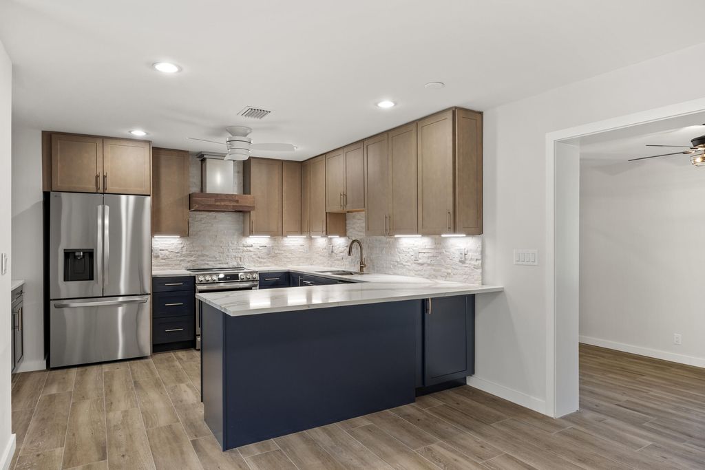 Photo of 323 Flagler Boulevard, Lake Park, FL 33403 (MLS # R10968737)