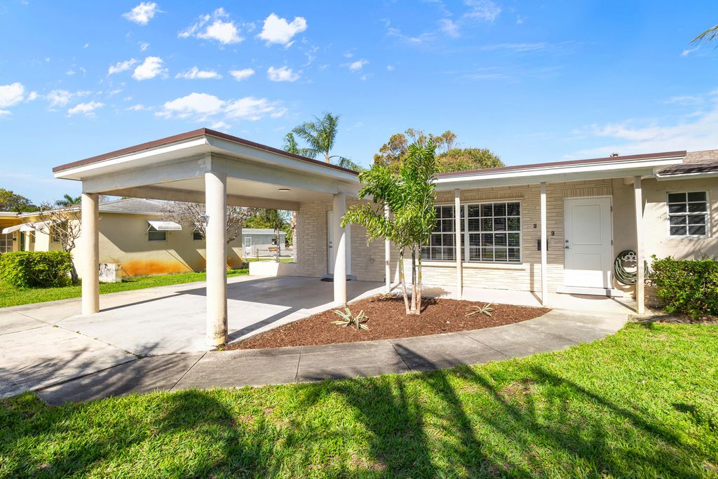 Photo of 323 Flagler Boulevard, Lake Park, FL 33403 (MLS # R10968737)
