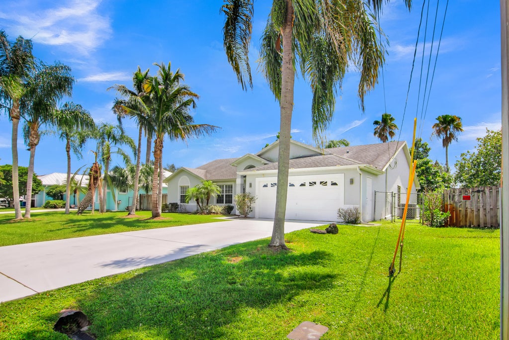 Photo of 272 SW Carter Avenue, Port Saint Lucie, FL 34983 (MLS # B26046285)