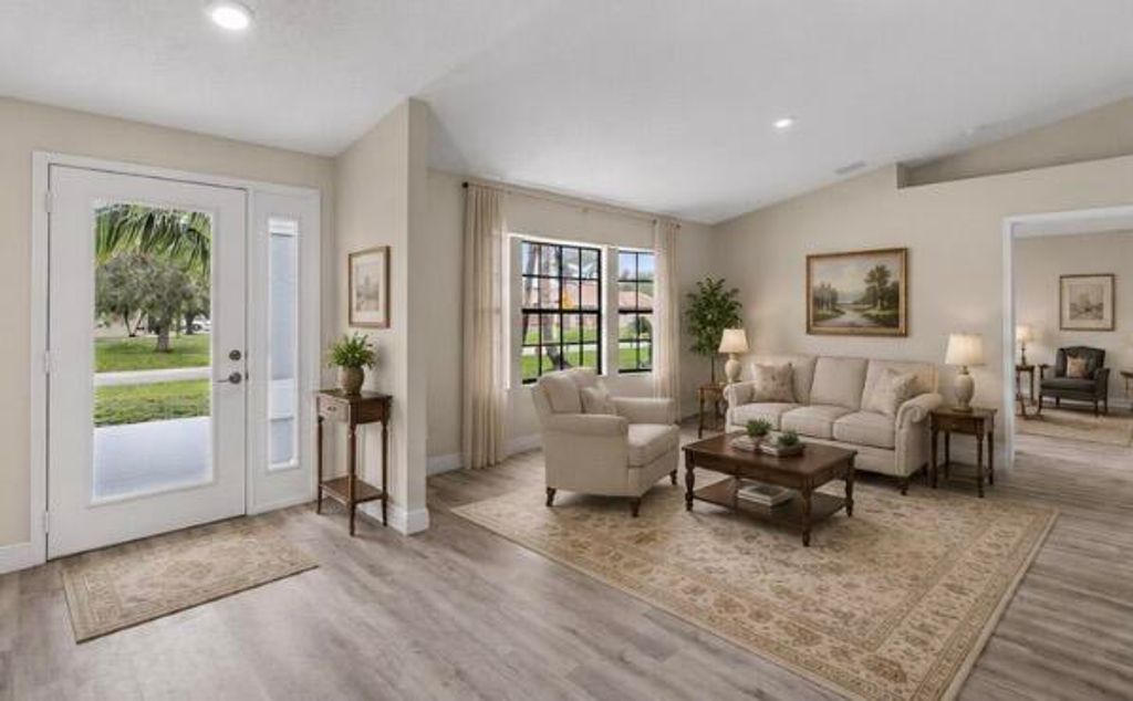Photo of 272 SW Carter Avenue, Port Saint Lucie, FL 34983 (MLS # B26046285)