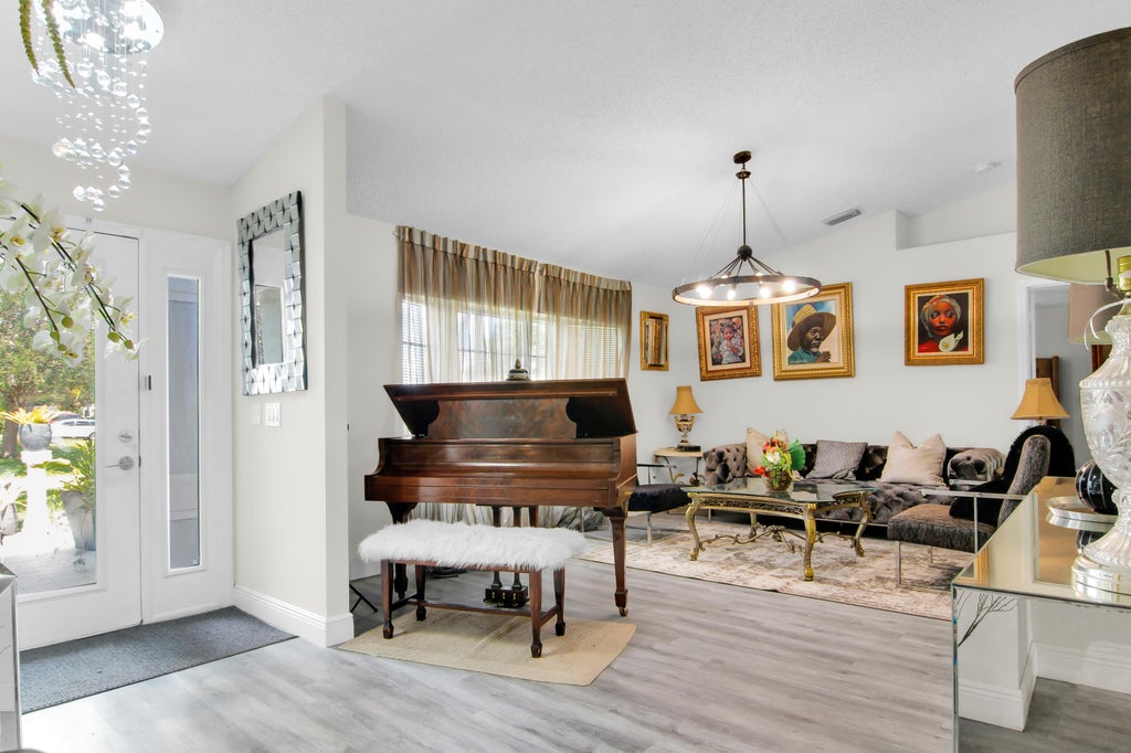 Photo of 272 SW Carter Avenue, Port Saint Lucie, FL 34983 (MLS # B26046285)