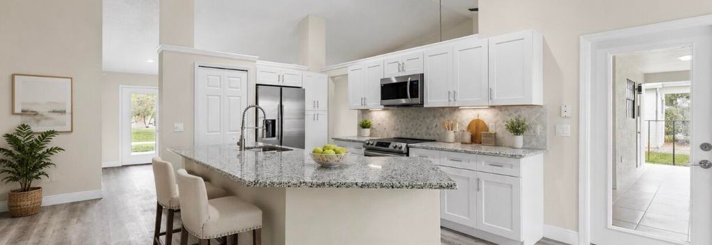 Photo of 272 SW Carter Avenue, Port Saint Lucie, FL 34983 (MLS # B26046285)