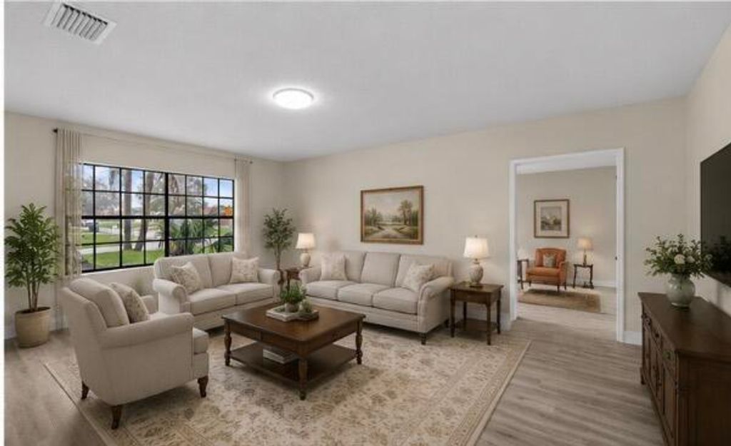 Photo of 272 SW Carter Avenue, Port Saint Lucie, FL 34983 (MLS # B26046285)