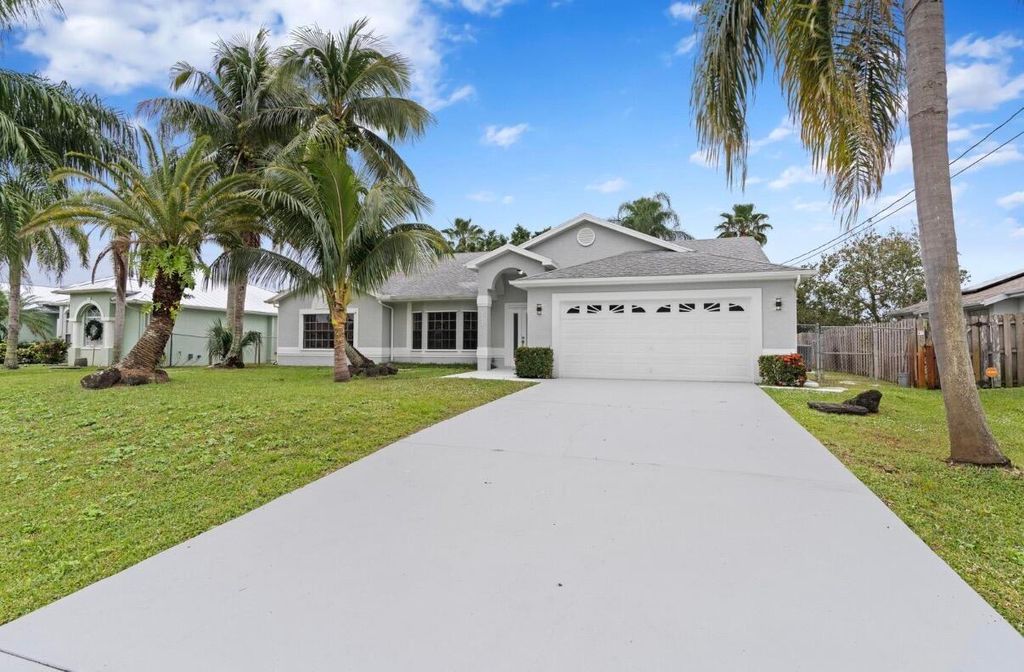 Photo of 272 SW Carter Avenue, Port Saint Lucie, FL 34983 (MLS # B26046285)
