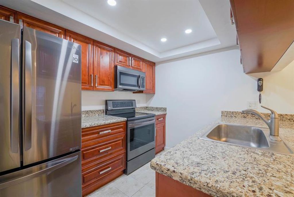 Photo of 661 Waterside Drive, Hypoluxo, FL 33462 (MLS # B26008867)