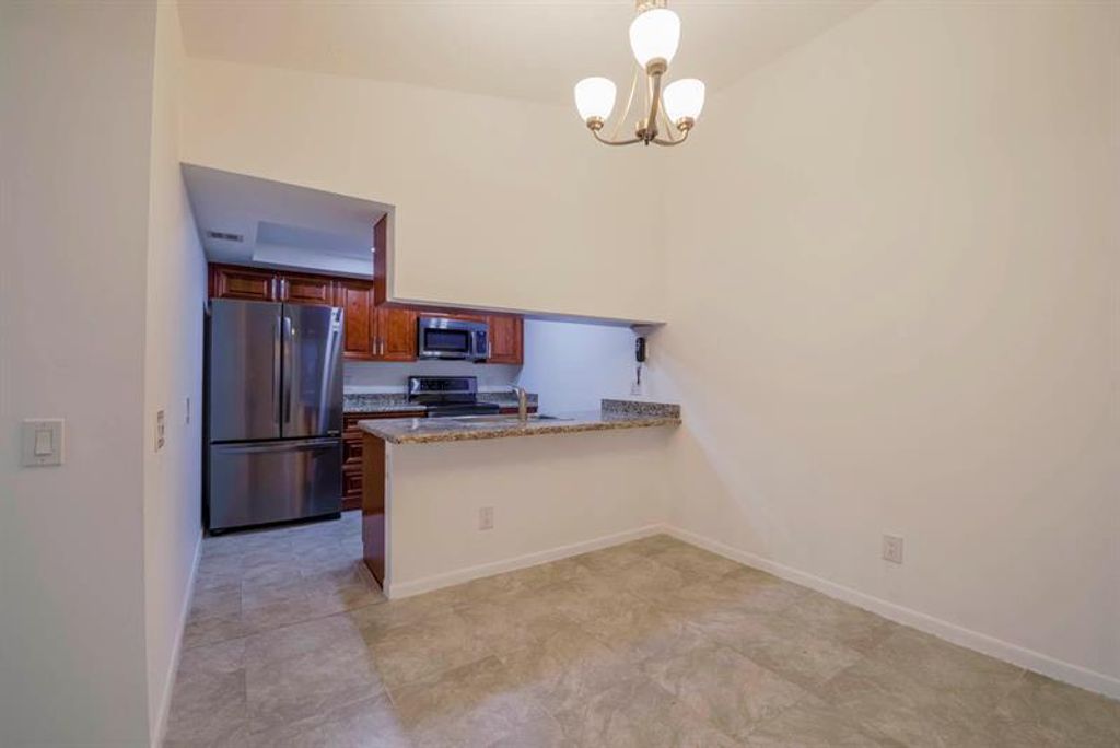 Photo of 661 Waterside Drive, Hypoluxo, FL 33462 (MLS # B26008867)