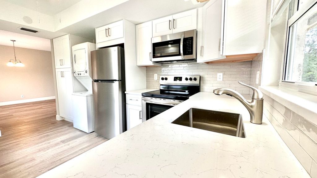 Photo of 13586 Sabal Palm Court #D, Delray Beach, FL 33484 (MLS # B26009479)