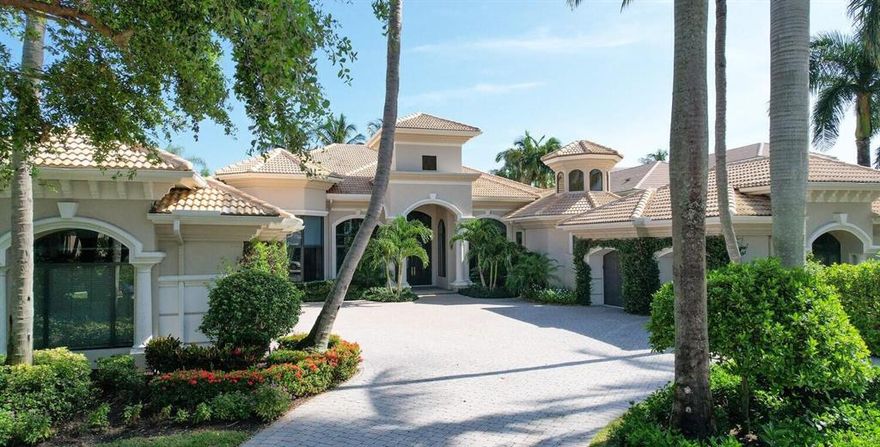 This Beautiful ''one of a kind'' Casto Custom Built Estate Home is situated on over a 1/2 acre with spectacular views of the Championship Caliber ''East'' Course, Hole 2. 305 Grand Key Terrace is 1 of 12 custom estate homes in Grand Key, a gated community within BallenIsles CC. 
This single-story open floor plan home is an entertainer's dream! The Large living area has stunning views of the expansive outdoor living space, golf, pool and lush landscaping.  The Master Suite has his and her bathrooms and closets, a morning bar, exercise studio, and sitting area. In addition, there are 3 large ensuite bedrooms with walk-in closets, 2 half baths, an Office/Library, Wine Closet, and Bar. The Gourmet Kitchen offers a Thermador 6 burner gas range, Thermador double oven, Sub-zero refrigerator Sub-zero freezer, 2 Sub-zero beverage drawers, 2 Miele dishwashers, prep island, large breakfast bar, pantry, and desk. The kitchen opens to a large breakfast/dining area and family room. This light and bright space flows naturally out to the 700+sqft tropical outdoor lanai with tongue & groove cedar ceiling, summer kitchen with grill, pizza oven, beverage fridge, ice maker and dining and living spaces, a heated salt system pool, spa, fountain, sun deck, summer kitchen with grill, pizza oven, beverage fridge, ice maker and dining and living space. Oversized 4car attached garage and 2car detached garage complete this beautiful estate home.   The 2car detached garage can be converted to a guest house. Full house generator. Grand Key Estates is located on an exclusive street, close to the magnificent Grand Clubhouse and East Golf Course. BallenIsles offers its members 1st class amenities including 3 Championship golf courses, State of the Art Tennis facilities with 20 Har-Tru Clay Courts, State of the Art Fitness Center, A Spa and Salon, Pools and 6 Dining options.