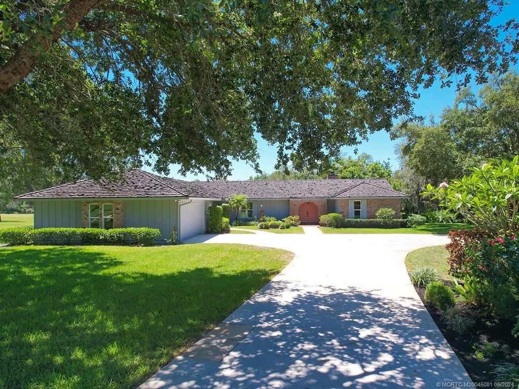 Photo of 1644 SW Saint Andrews Drive, Palm City, FL 34990 (MLS # R10991098)