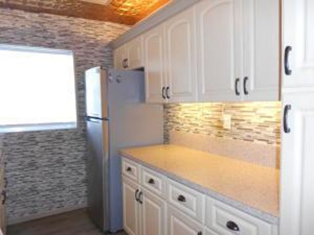 Photo of 5061 Lakefront Boulevard #C, Delray Beach, FL 33484 (MLS # R11117047)