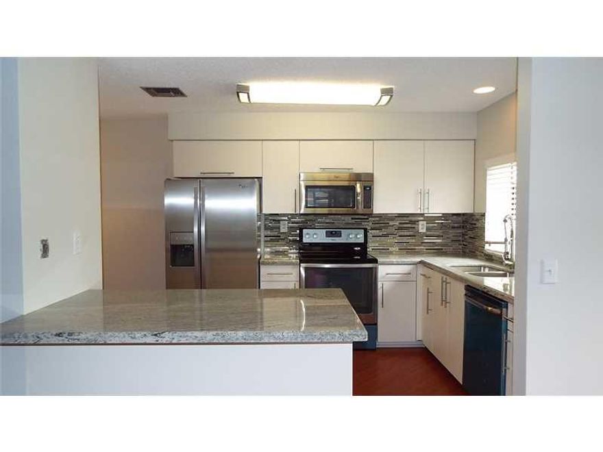 RARELY AVAILABLE, TWO BEDROOM 2.5 BATH REMODELED CONTEMPORARY TOWNHOME LOCATED IN BEAUTIFUL CENTRAL PARK. FEATURES INCLUDE FRESHLY PAINTED INSIDE & OUT~ NEW EURO STYLE CABINETS, GRANITE COUNTERTOPS AND GLASS MOSAIC BACKSPLASH. ALL NEW STAINLESS STEEL APPL IANCES~ HIGH VAULTED CEILINGS AND NEW LAMINATE FLOORING THRUOUT. 1ST FLOOR MASTERBEDROOM WITH WALK-IN CLOSET ~ALL BATHS REMODELED INCLUDING GRANITE TOPS WITH GLASS VESSEL SINKS~SPOTLESS, MOVE- IN CONDITION~CLOSE TO ALL SHOPPING AND EASY ACCESS TO I-595.