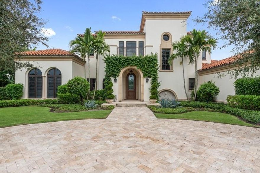 Entering this truly stunning estate home in the Cypress Island community of Palm Beach Polo you are aware of why South Florida is an oasis of the indoor/outdoor lifestyle. This 5 Bedroom, 5.5 Bath two story pool home with a four car garage boasts quality workmanship and unique appointments throughout. Step into the elegant living room and formal dining room perfect for entertaining. The adjacent kitchen and family room feature the utmost balance of beauty and functionality, superb for serious cooking and informal gatherings with family and friends. Master bedroom suite luxuries include walk-in closets, marble bathroom and state of the art fitness room. The second floor bedrooms and lounge with expansive open terrace offer a spectacular view overlooking the water and the notable Cypress Golf Course. Outdoor living area with retractable screens, outdoor kitchen and fireplace all open onto the immaculate back yard, complete with oversized pool and spa. Private guest house with separate living room and wet bar are a bonus. This incredible residence features the craftsmanship and architecture of another era with the modern technology of today. 7,040 sq. ft. of living area and 9,638 total sq. ft. Discover wonderful Wellington!