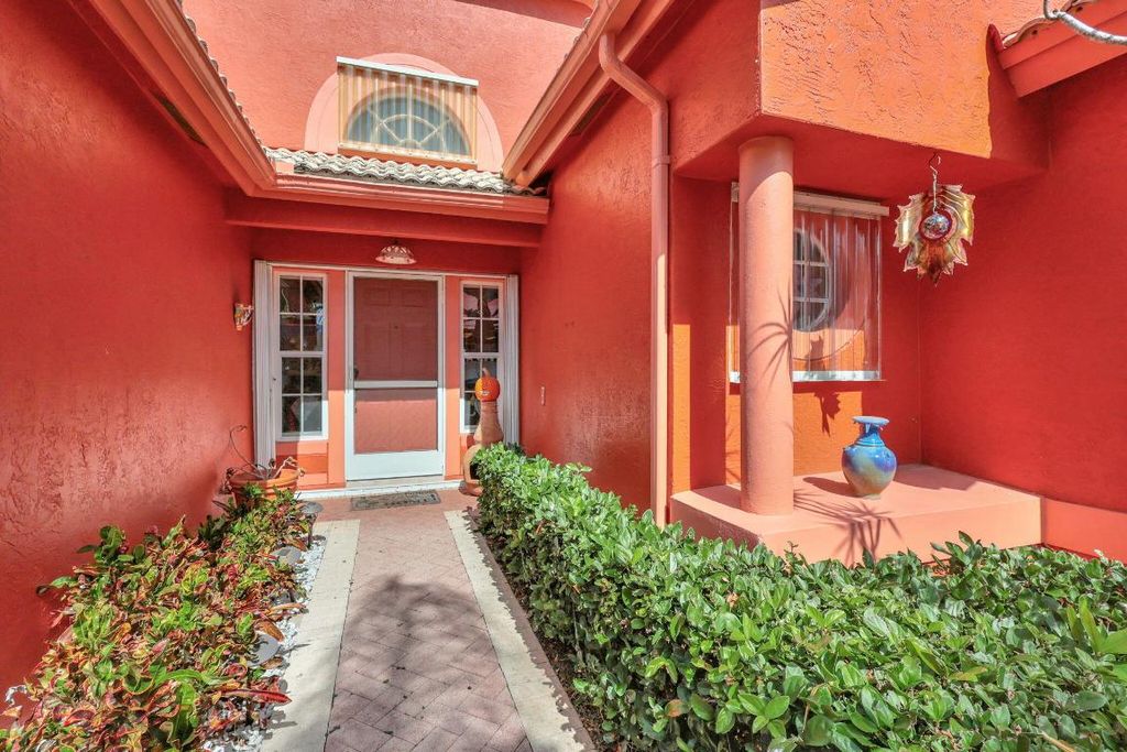 Photo of 2745 Pointe Circle, Greenacres, FL 33413 (MLS # R10979664)