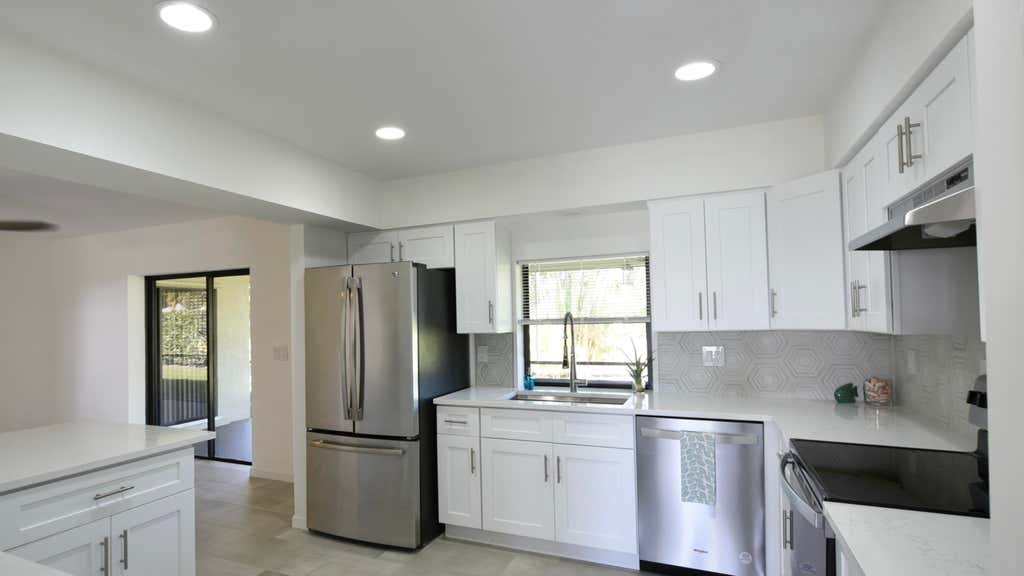 Photo of 57 Pinehill Trl W, Tequesta, FL 33469 (MLS # R10957115)