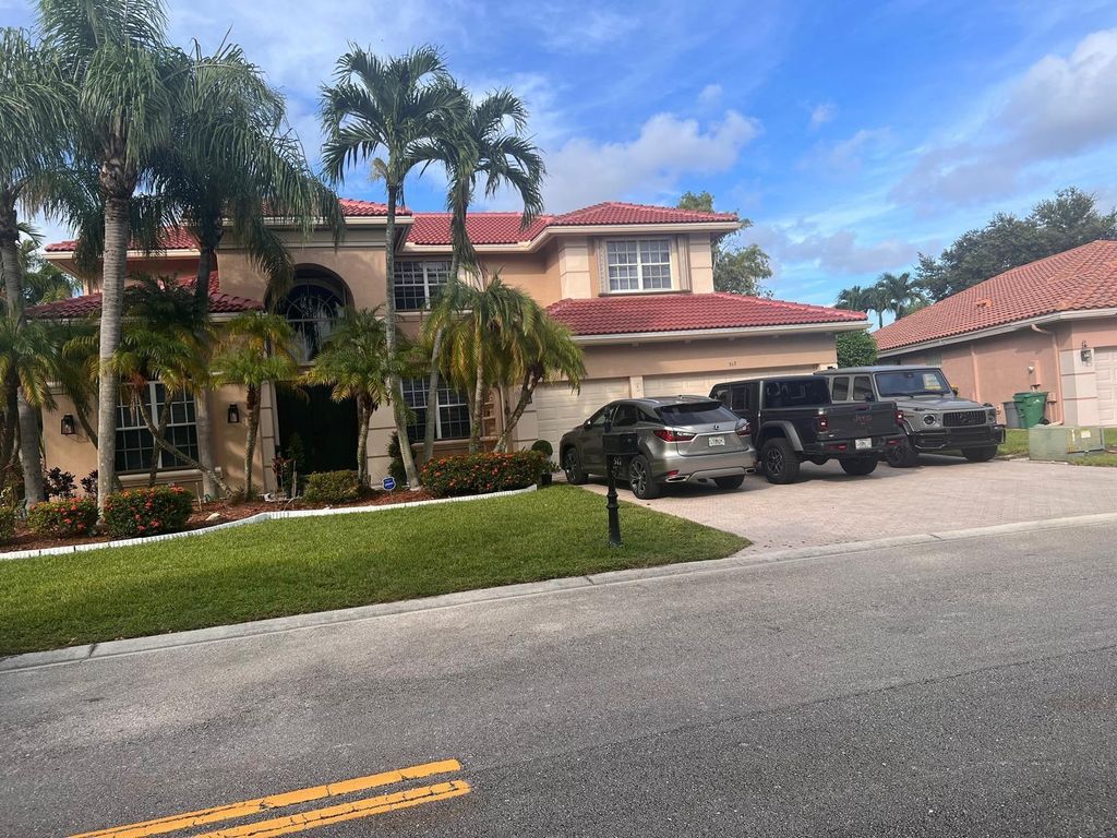 Photo of 517 NW 118th Way, Coral Springs, FL 33071 (MLS # F10556735)