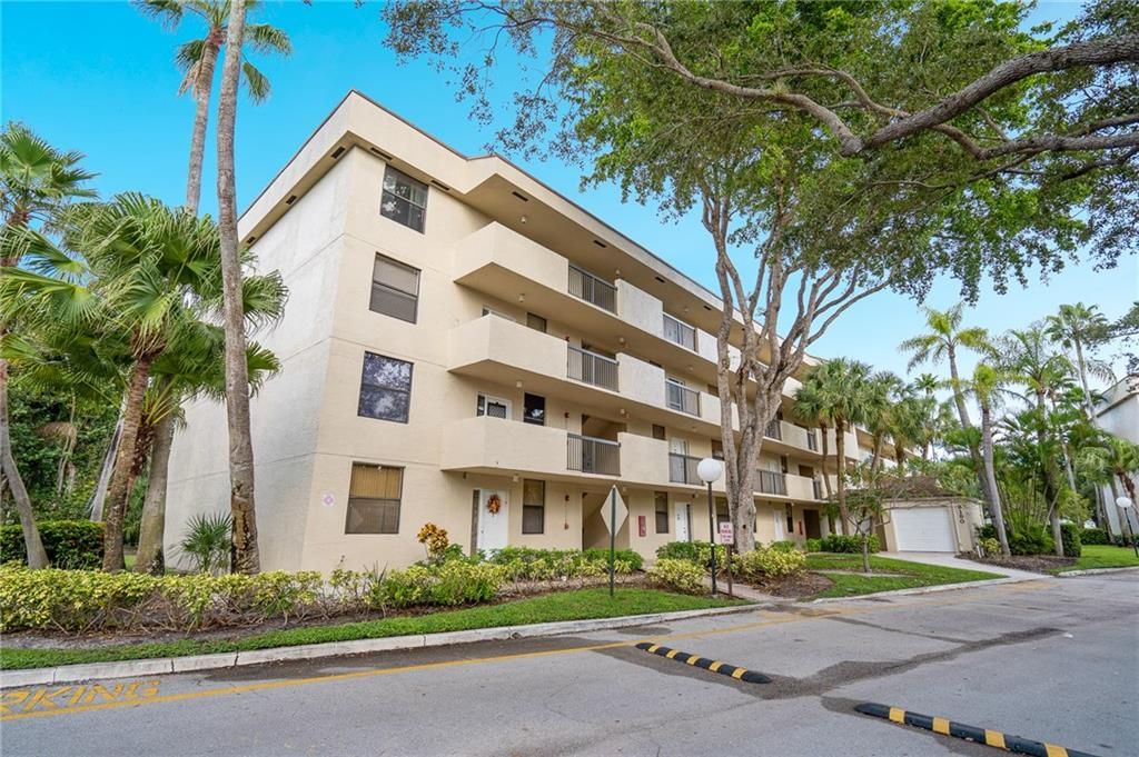 Photo of 3150 NW 42nd Ave #406, Coconut Creek, FL 33066 (MLS # F10308505)