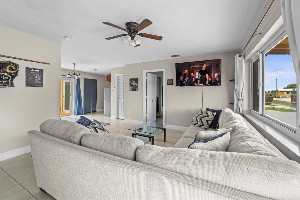 Photo of 1528 Singletary Avenue, Pahokee, FL 33476 (MLS # R11095936)