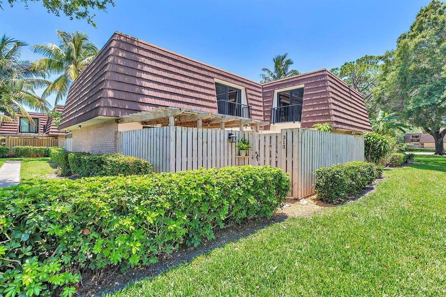 Complete renovation unlike any other DiVosta townhouse! Over $85,000 spent on top-of-the-line PGT Impact Doors & windows, cabinetry, wi-fi enabled appliances, kitchen, bathrooms, flooring, moldings, doors, plumbing, electric, insulation, and more.  Floorplan has been modified for a spacious kitchen with window overlooking private patio, 2 separate master suites upstairs, beautiful laundry room (steam washer & dryer), and oversized master bathroom. Feels more like new construction! Private location with view of green area. Community has tennis, racquetball, basketball, pickleball, playground & jogging trail. Less than 1 mile away from PBG pool & water park! Walk to Elementary & Middle Schools, Publix and a dozen restaurants! No pickups or rentals first 6 months.