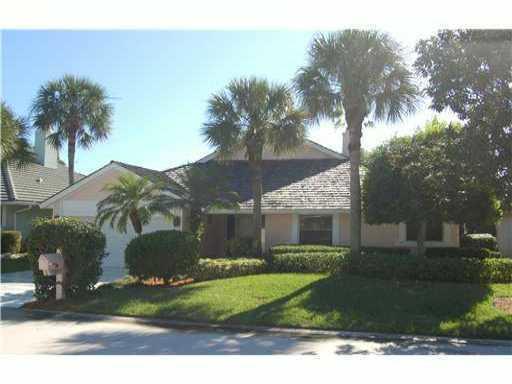 Enlarged and modified by present owner when built. Custom built-ins ,murphy bed, fireplace, storm shutters. Walk to golf club and fitness center. Charming, pet friendly village.