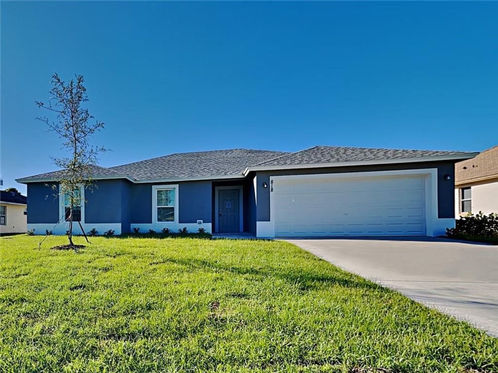 Photo of 818 SW Mccracken Ave Ave, Port Saint Lucie, FL 34953 (MLS # F10352564)