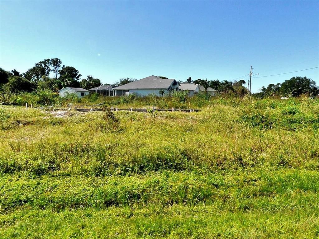 Photo of 1002 SW Sudder Avenue, Port Saint Lucie, FL 34953 (MLS # R10793203)