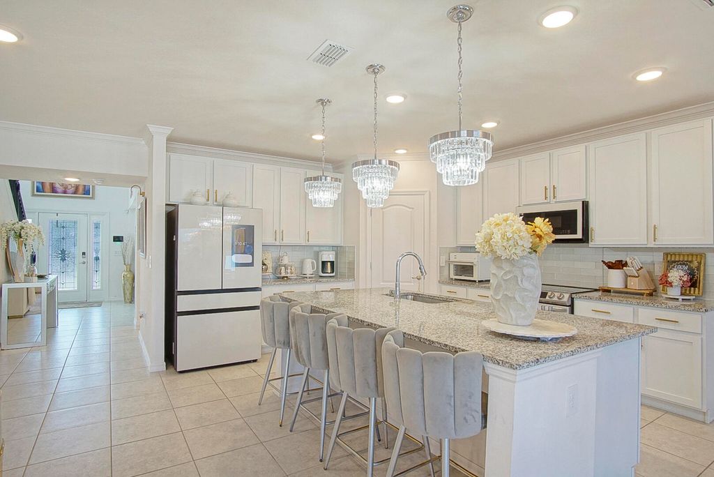 Photo of 3498 SW Ronald Street, Port Saint Lucie, FL 34953 (MLS # R10931966)