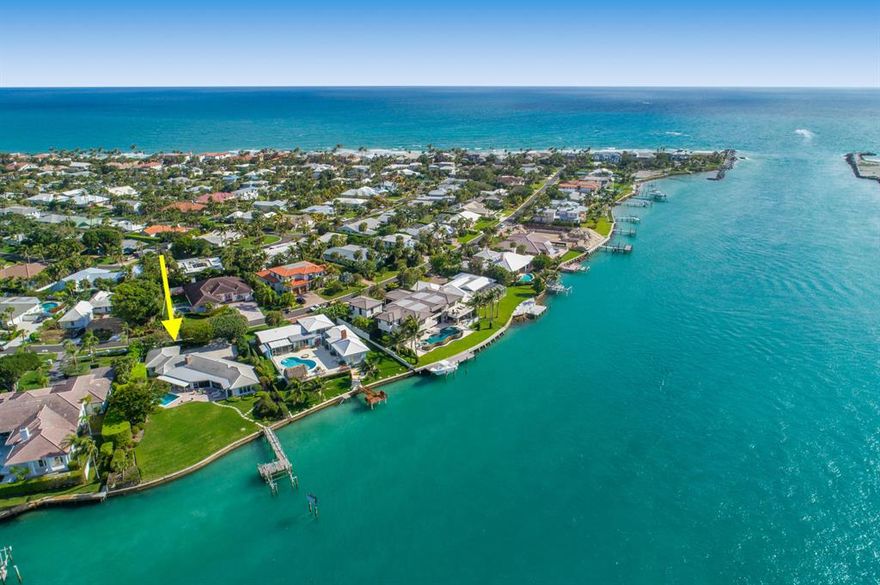 One of the premier waterfront homesite on the east coast of FL directly on the blue water where the Jupiter Inlet meets the Intracoastal waterway overlooking the historic Jupiter Lighthouse. This charming single-story home on spectacular point lot, features panoramic views of Jupiter Inlet and Intracoastal Waterway, including Jupiter Lighthouse. Spacious floor plan includes 4 bedrooms, 3 bathrooms, 2 car garage and large kitchen with custom cabinetry overlooking the private pool, yard and dock with boat lift. 4th bedroom is small and can also be used as a den.