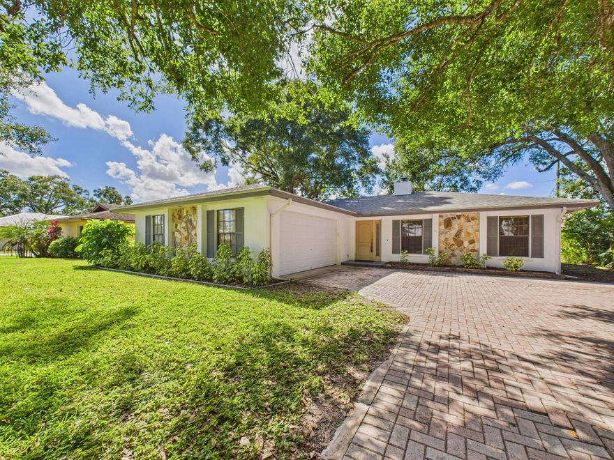 Pet- friendly charming 3-bedroom, 2-bath home in north-central Vero Beach! Enjoy easy-care tile floors throughout, a screened porch overlooking a private backyard, and a garage with built-in workbenches. Nestled in a beautiful, mature neighborhood with shady trees, this home offers comfort, convenience, and a pet-friendly setting close to shopping, dining, and beaches. No hoa