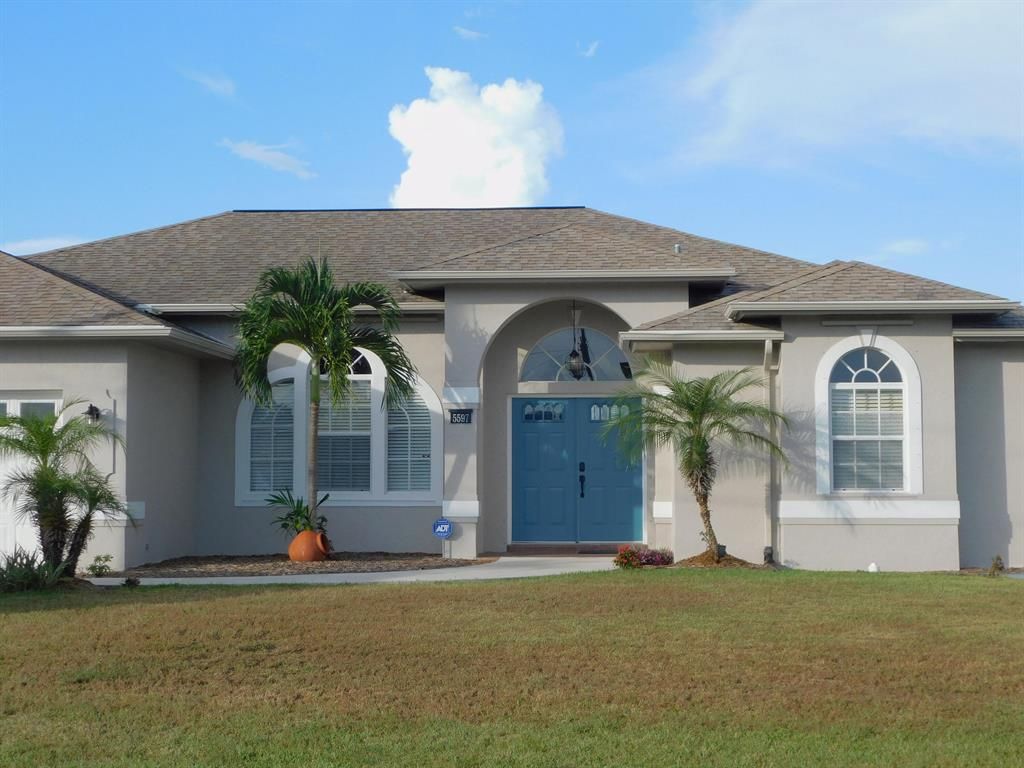 Photo of 5597 NW Wesley Road Rd, Saint Lucie West, FL 34986 (MLS # R10822324)