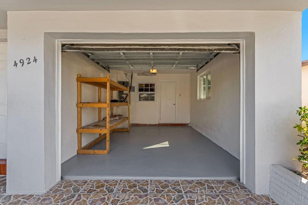 Photo of 4924 NW 52nd Court, Tamarac, FL 33319 (MLS # F10551277)