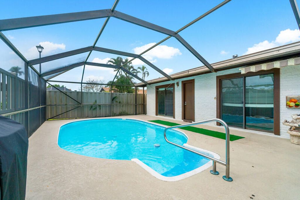 Photo of 9939 Boca Gardens Trl #D, Boca Raton, FL 33496 (MLS # R11059470)