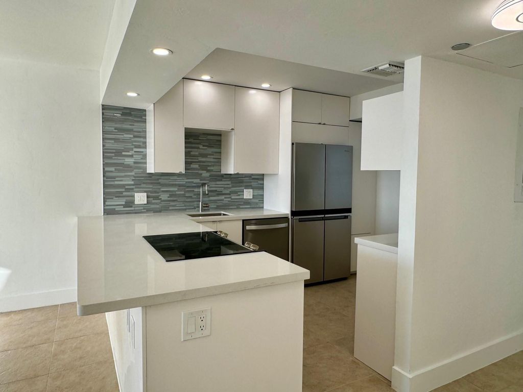 Photo of 3095 N Course Drive, Pompano Beach, FL 33069 (MLS # B26026886)