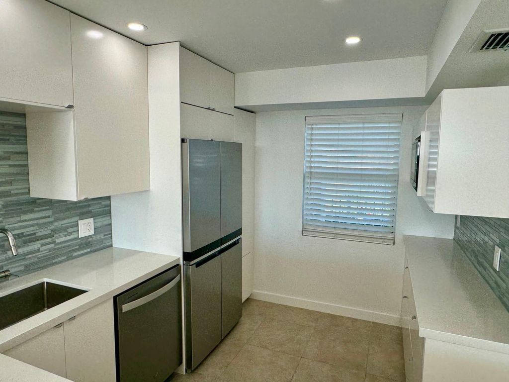 Photo of 3095 N Course Drive, Pompano Beach, FL 33069 (MLS # B26026886)