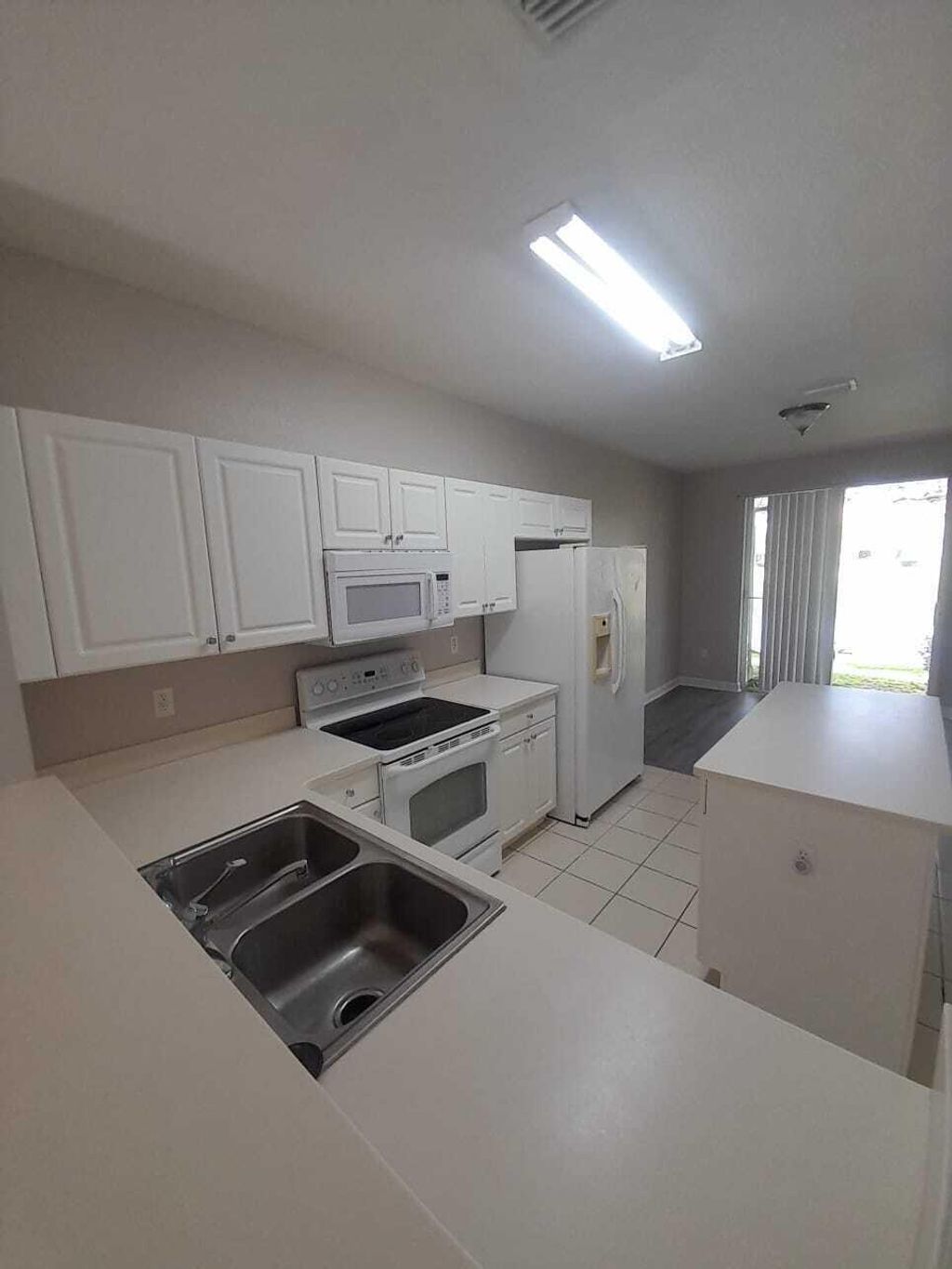 Photo of 4157 Napoli Lake Drive, Riviera Beach, FL 33410 (MLS # R11018637)