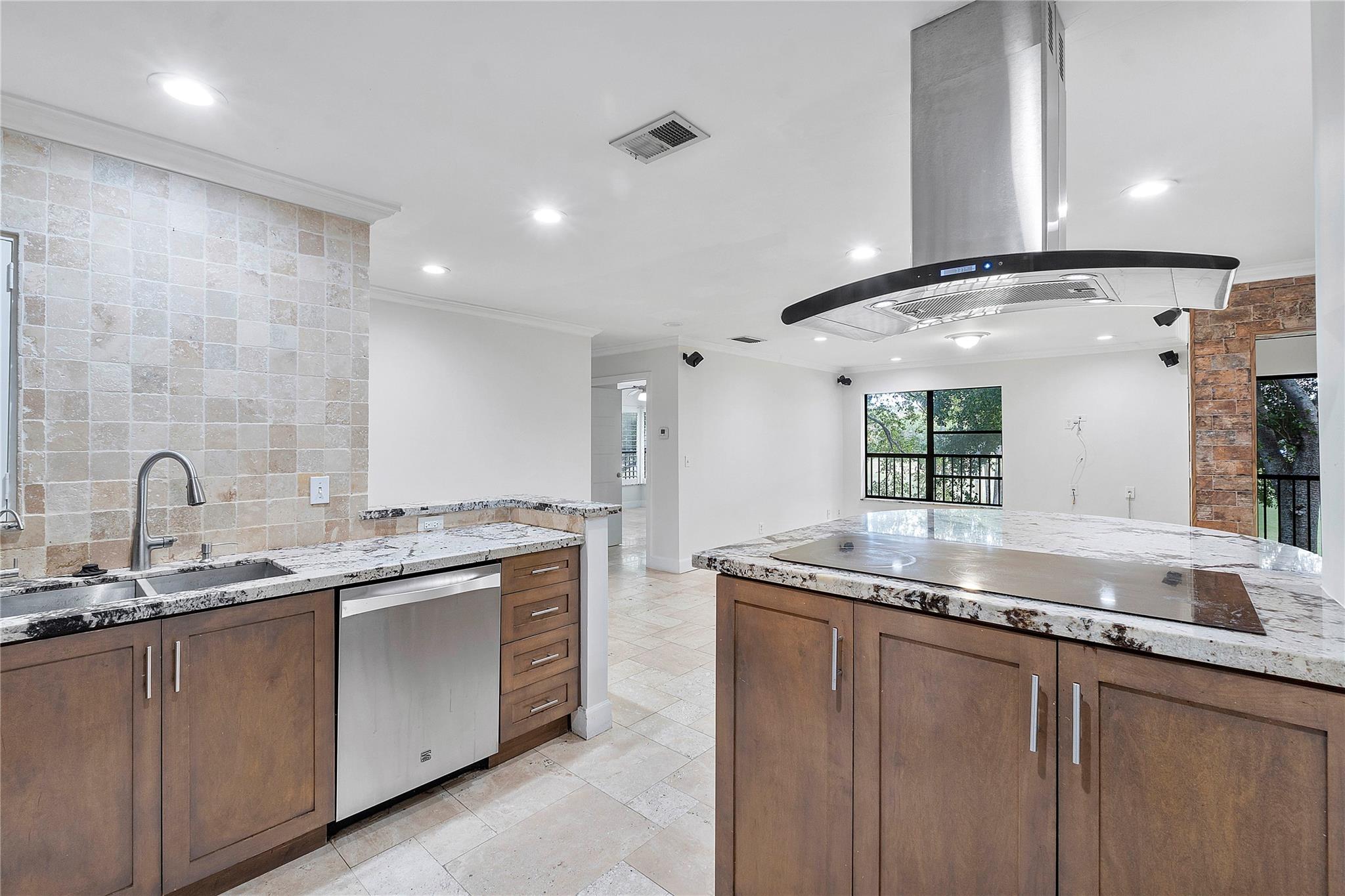 Welcome home to this beautifully upgraded condo! Enjoy timeless luxury upgrades including travertine flooring throughout, a custom open-concept kitchen with Swiss Alps granite, Kenmore Elite stainless steel appliances, water filtration system, surround sound system, recessed lighting, and more. Large primary suite features a spa-like bathroom and a custom walk-in closet. A converted patio extends your living space, perfect for formal dining or relaxing. Additional perks include attic storage, a new 2023 roof, tankless water heater, and two designated parking spots. Membership to The Township includes access to fitness center, Olympic pool, theater, sports courts (tennis, pickleball, etc), and community events. Nearby spots include the Promenade Mall, Tradewinds Park, Casino, and more.