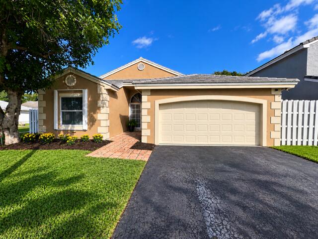 Photo of 5585 NW 55TH Drive, Coconut Creek, FL 33073 (MLS # B26091793)