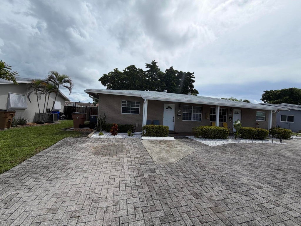 Photo of 1408 SE 3RD Terrace, Deerfield Beach, FL 33441 (MLS # B26078474)