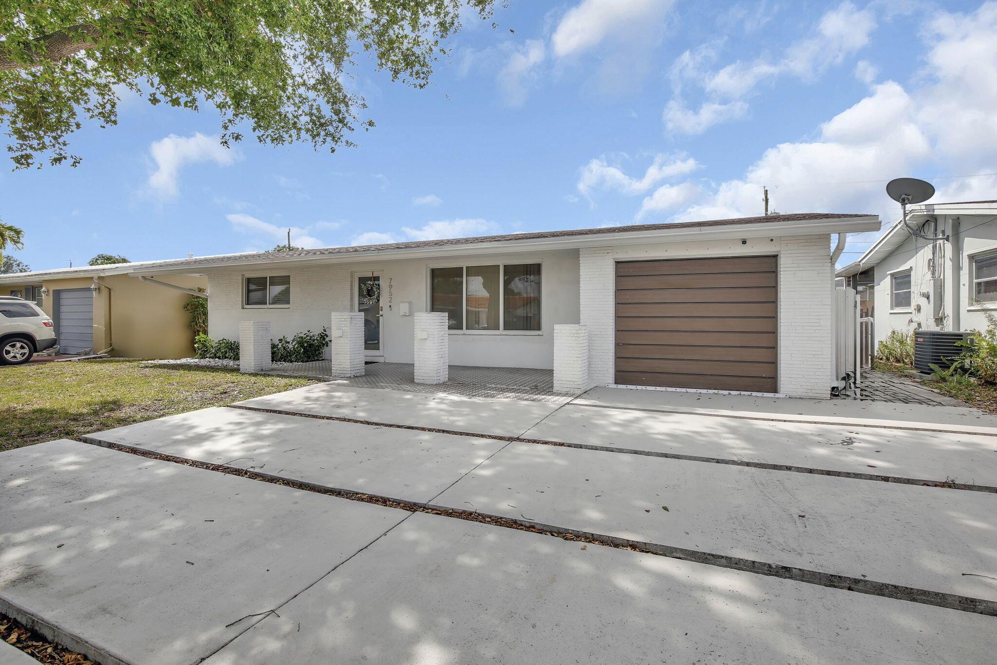 $35,000 PRICE REDUCTION. Motivated Seller. Income-Producing Pool Home - No HOA! Discover this stunning, updated, and unique 4-bedroom, 4-bathroom home with two efficiencies, each featuring a kitchenette, bathroom, and private outdoor entrance -- perfect for rental income, as a residence, or both. Enjoy a spacious backyard with a pool, jacuzzi, outdoor bathroom, workspace, and storage unit. Recent updates include a new roof (2019), AC (2019), kitchen remodel (2019), and upgraded plumbing (2020). Impact windows throughout for added security and efficiency. Located in a prime, non-HOA neighborhood, close to shopping, dining, beaches, and essential services. A rare opportunity for homeowners and investors alike!
