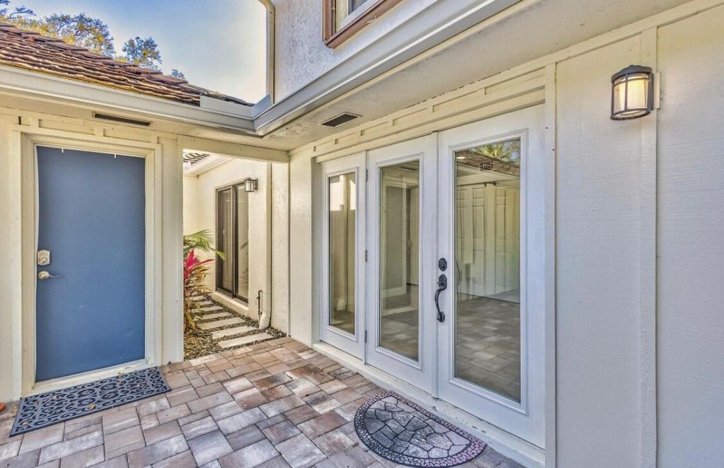Photo of 11433 Shady Lane, North Palm Beach, FL 33408 (MLS # B26000481)