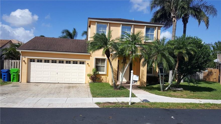 Sought after Banyan Estates 4 bedroom pool home!  Master bedroom with walk in closet, kitchen opens up to large family room, screened in private fenced with patio that overlooks the pool, great for entertaining! Home needs a little TLC to make it your own. Hurricane accordion shutters throughout. Exterior of home recently painted. It is priced to sell and will not last long. Sellers are motivated, make an offer today.