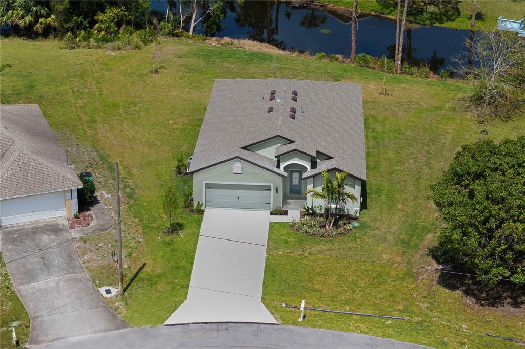 Photo of 605 SE Delancey Lane, Port Saint Lucie, FL 34984 (MLS # F10443178)
