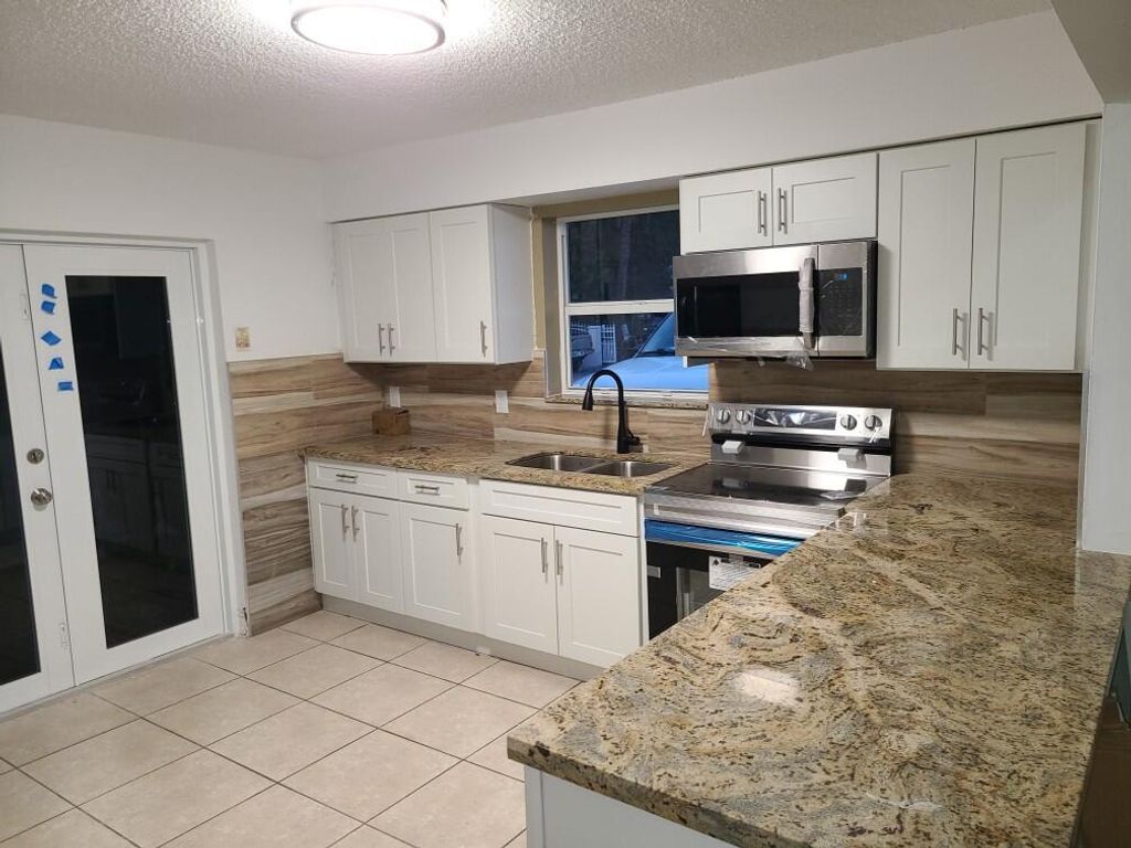 Photo of 1022 Green Street #1020, 1022, West Palm Beach, FL 33405 (MLS # R10772983)