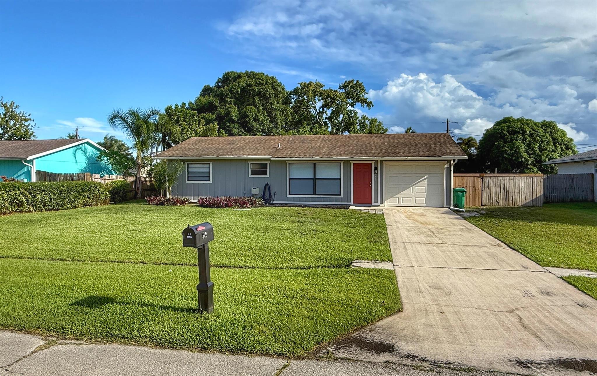 SEE THIS FULLY RENOVATED 2/2 TODAY BEFORE IT IS GONE! Close to all that Port Saint Lucie has to offer! Home features a fenced in backyard with patio table and chairs included for entertaining! Interior features in-home laundry room with stackable units included for use and laundry folding area with extra storage. Kitchen features gorgeous butcher block counter tops with stainless steel appliances. Master bedroom features private bathroom. A MUST SEE.
