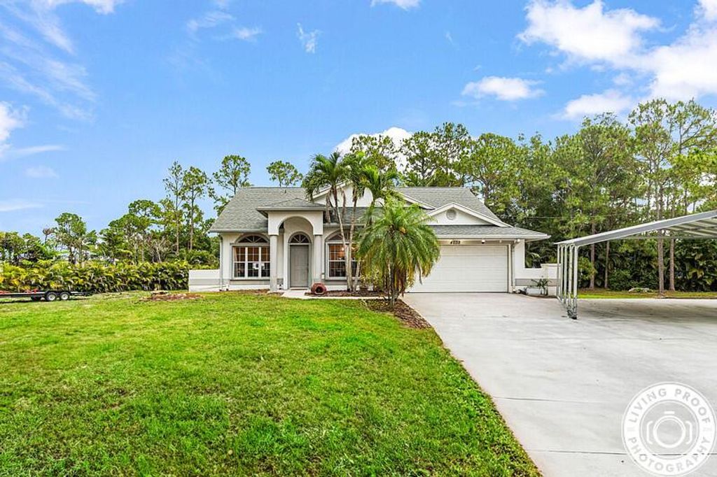 Photo of 4038 Calamondin Boulevard, The Acreage, FL 33470 (MLS # R11096783)