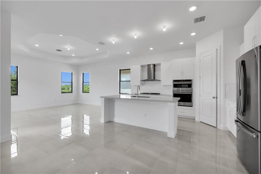 Photo of 12855 Bayside Ct, Parkland, FL 33076 (MLS # F10352108)