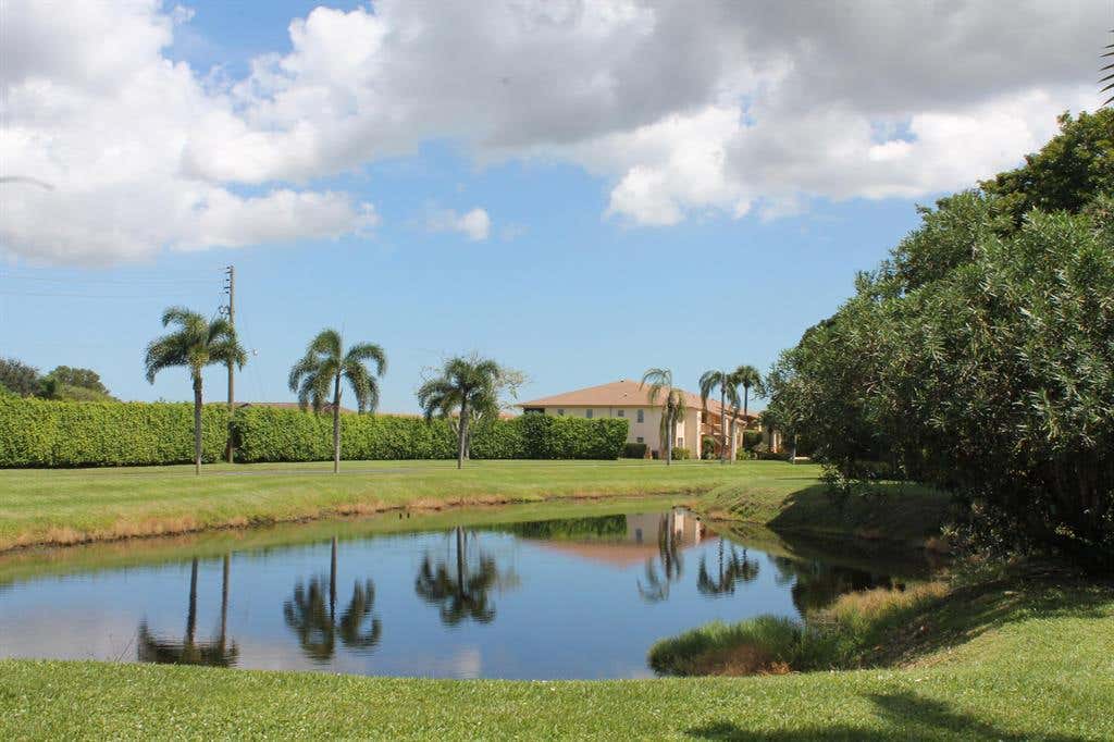 Photo of 5603 Queen Palm Court #D, Delray Beach, FL 33484 (MLS # R10747516)
